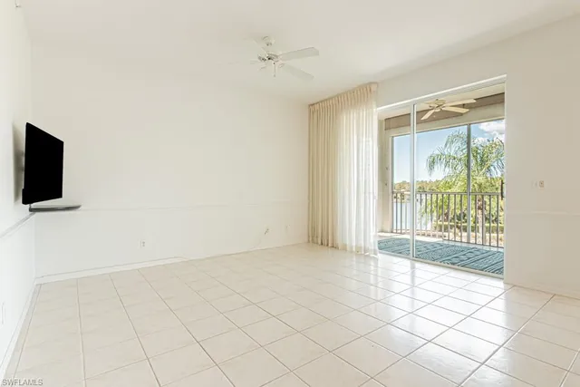 a view of a kitchen with furniture and a window