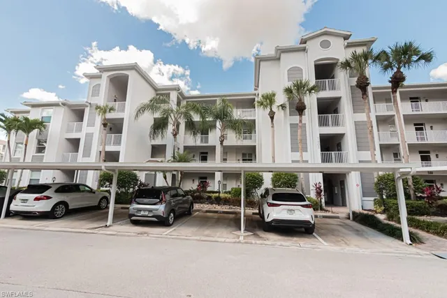 a view of a lake with a building in the background