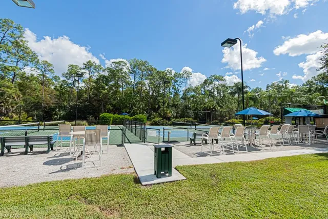 a view of an outdoor space and tennis court