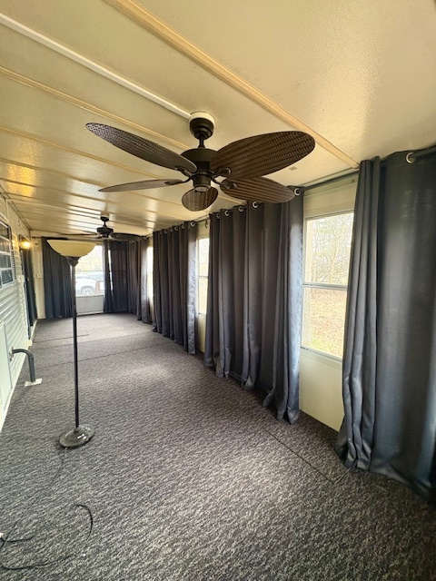 11-85 Woodhaven Sublette, IL 61367 - Photo 24 of 26 a view of a hallway with a glass door