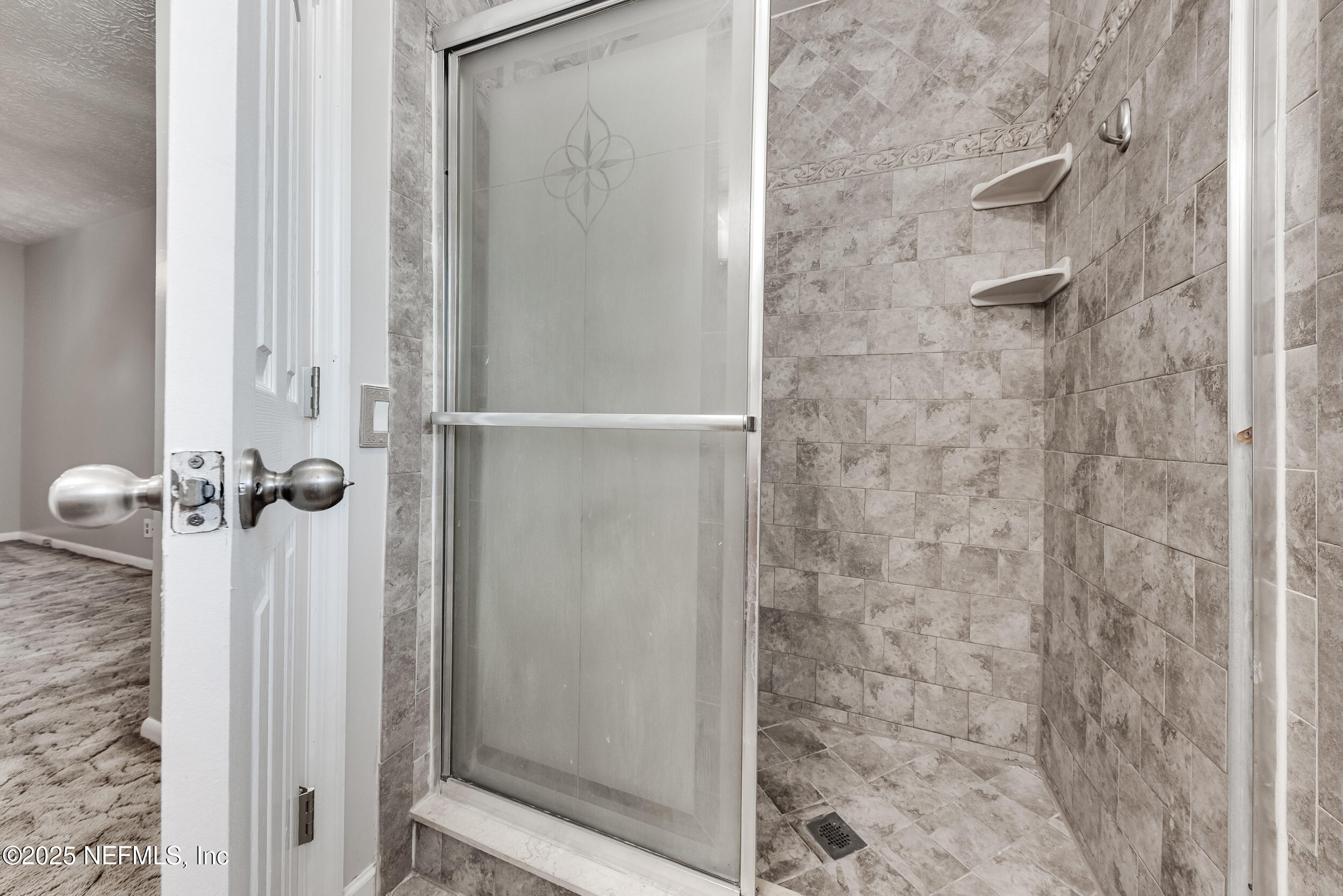 6149 Post Oak Road West Jacksonville, FL 32277 - Photo 19 of 25 a bathroom with a shower