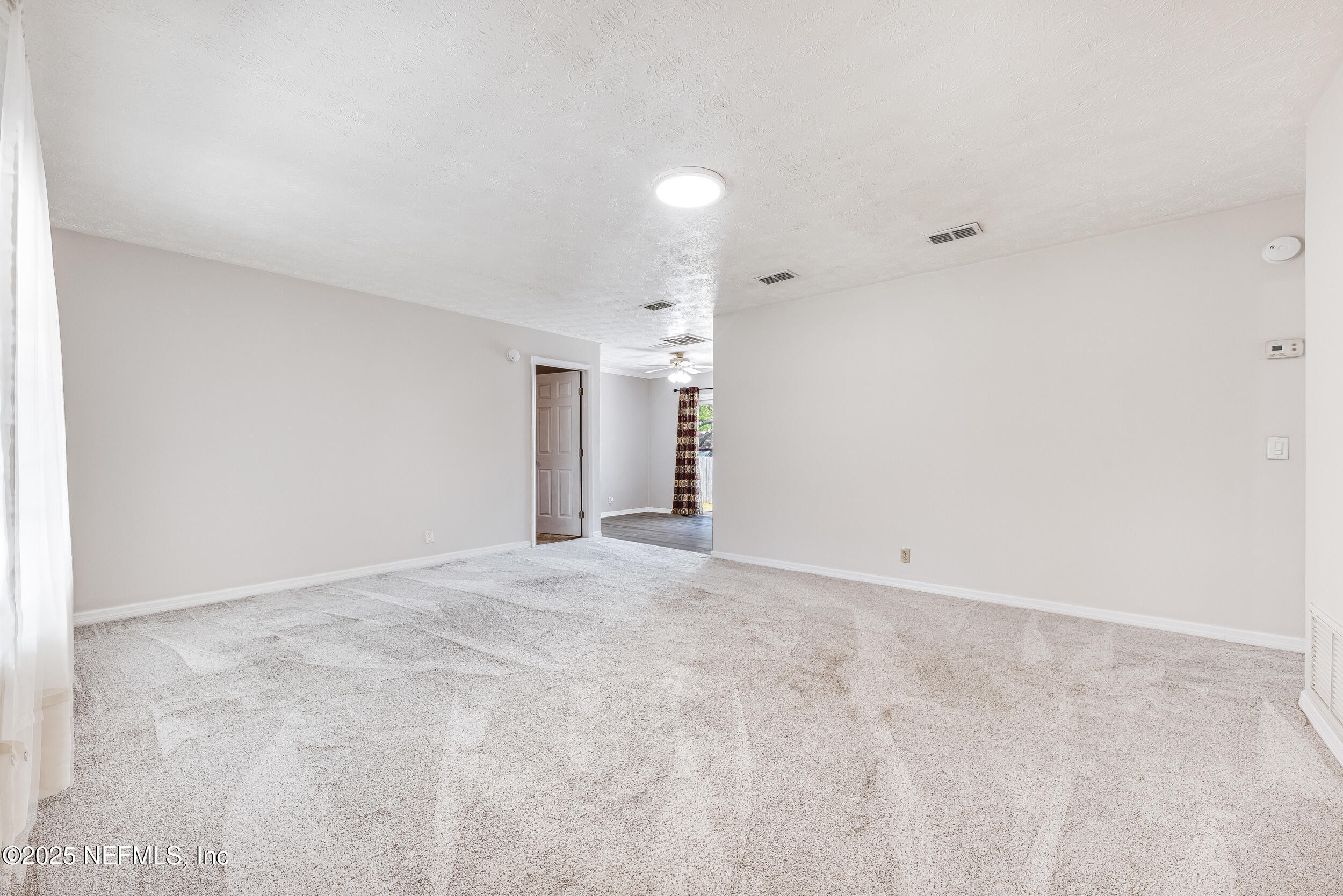 6149 Post Oak Road West Jacksonville, FL 32277 - Photo 7 of 25 a view of an empty room