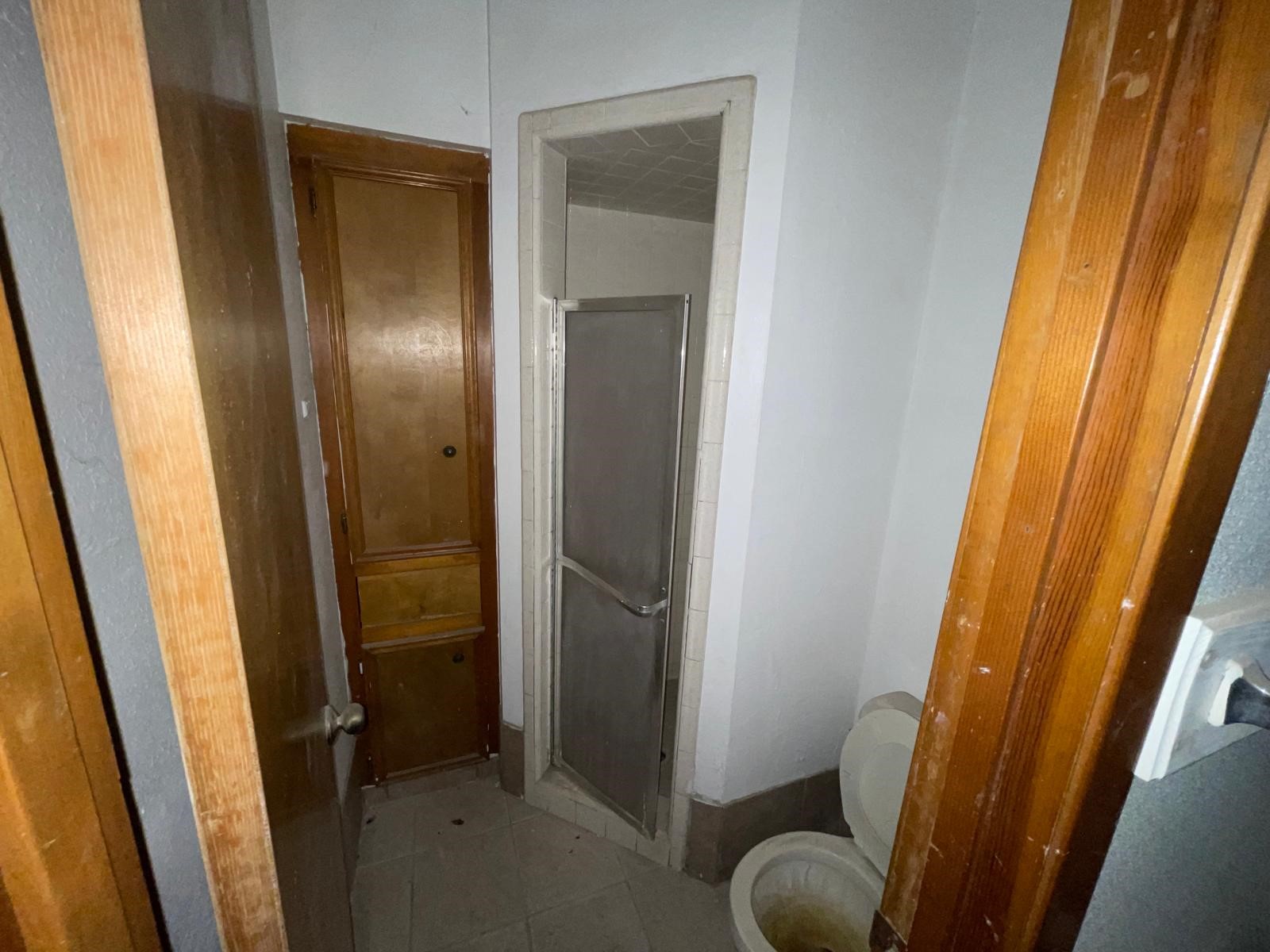 4602 Avenue H Rosenberg, TX 77471 - Photo 20 of 25 a bathroom with a granite countertop sink and toilet