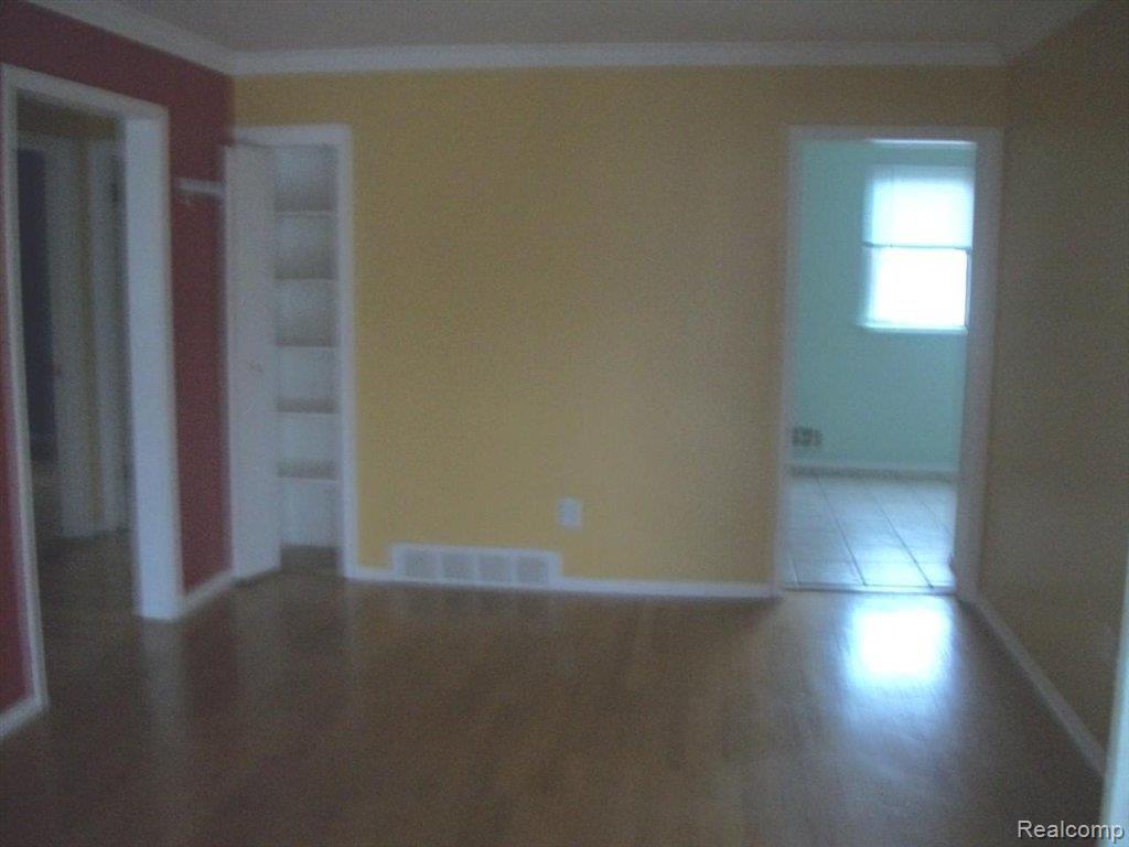 4030 West 13 Mile Road, Unit APH4 Royal Oak, MI 48073 - Photo 6 of 6 7091659511 Living Room.jpg