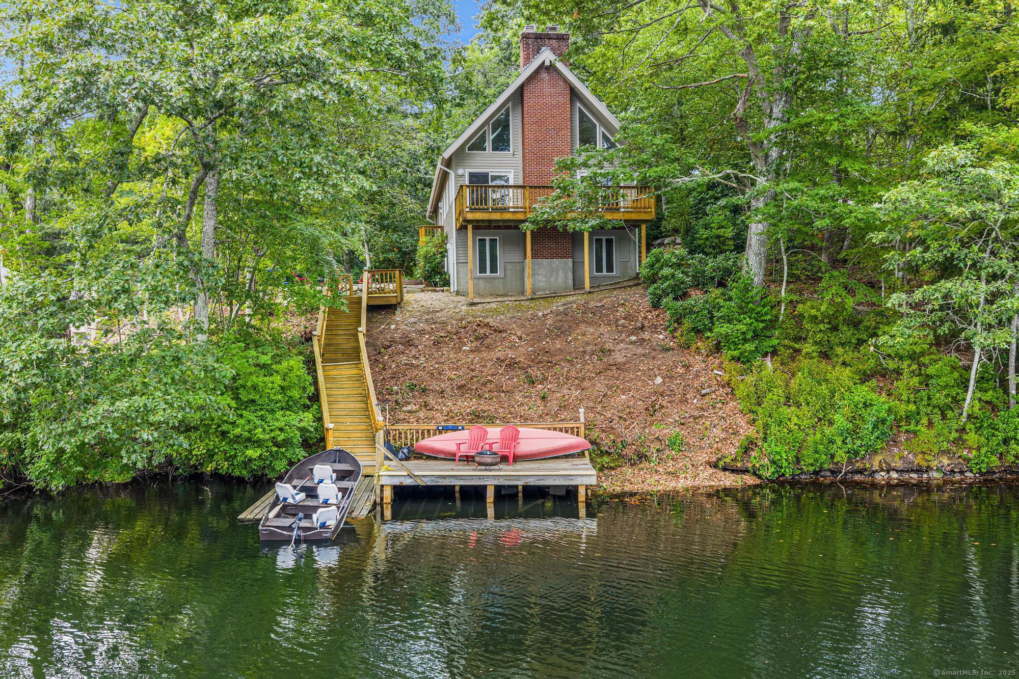 75 Homestead Road Ledyard, CT 06339 - Photo 1 of 1 a view of house with swimming pool yard and outdoor seating