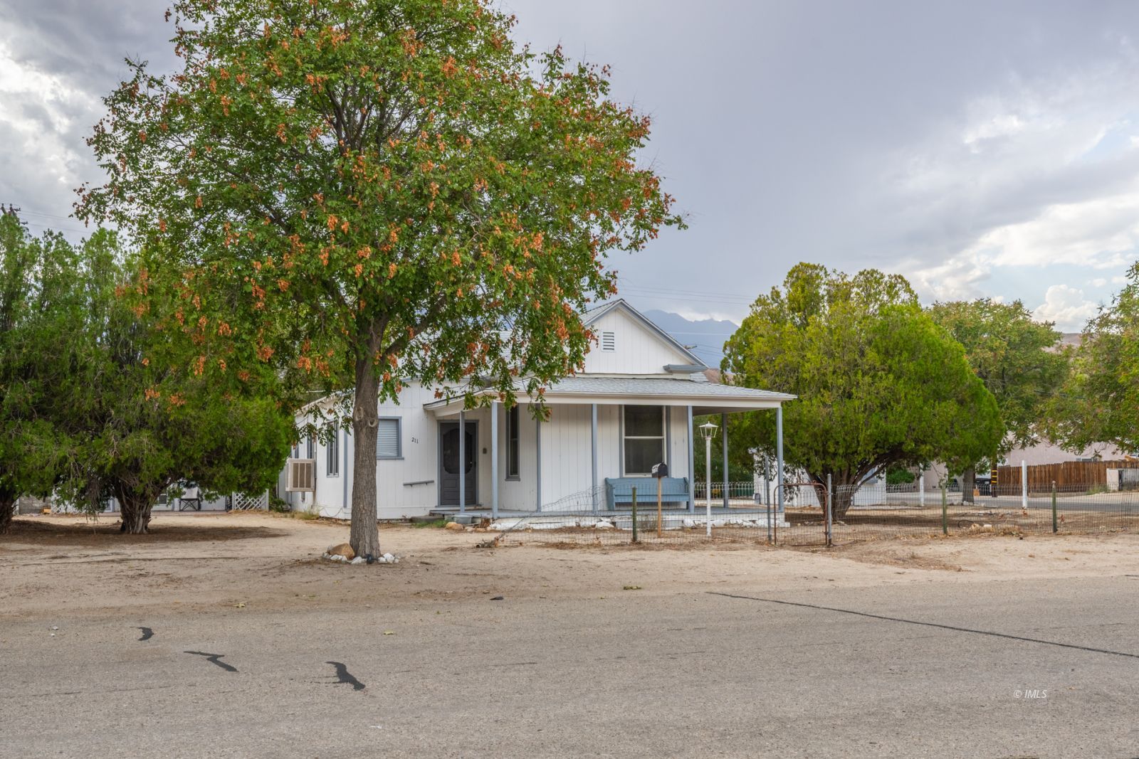 211 South Washington Street Lone Pine, CA 93545 - Photo 18 of 25 front view of a house with a street