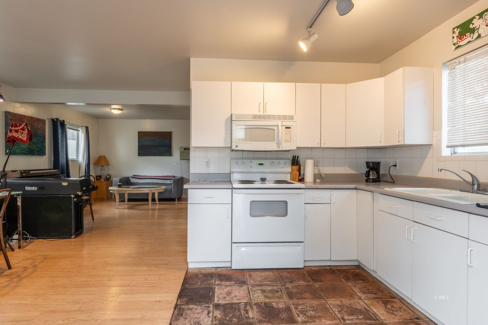 211 South Washington Street Lone Pine, CA 93545 - Photo 20 of 25 a kitchen with a sink cabinets and window
