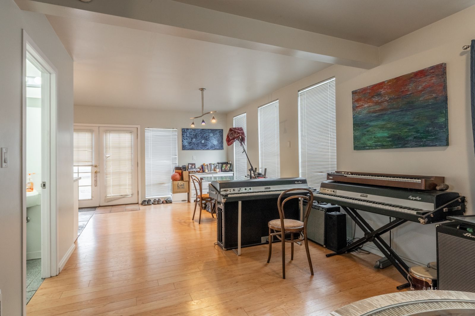 211 South Washington Street Lone Pine, CA 93545 - Photo 22 of 25 a view of a dining room with furniture window and wooden floor