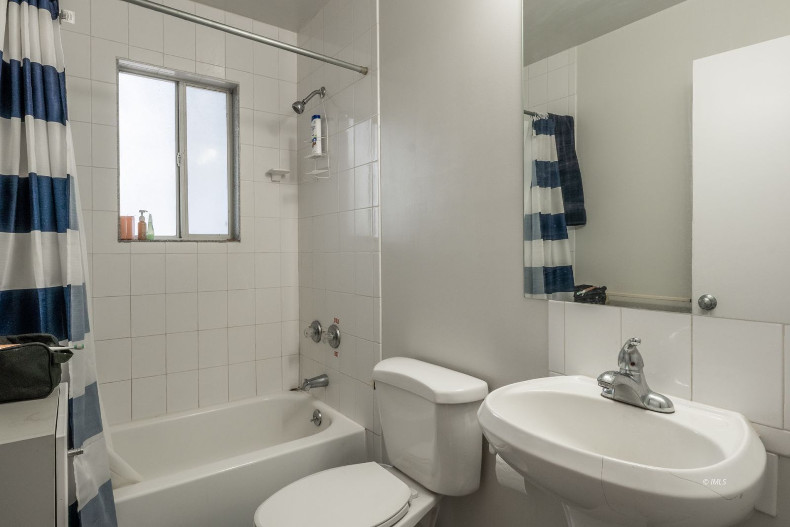 211 South Washington Street Lone Pine, CA 93545 - Photo 24 of 25 a bathroom with a sink toilet and shower