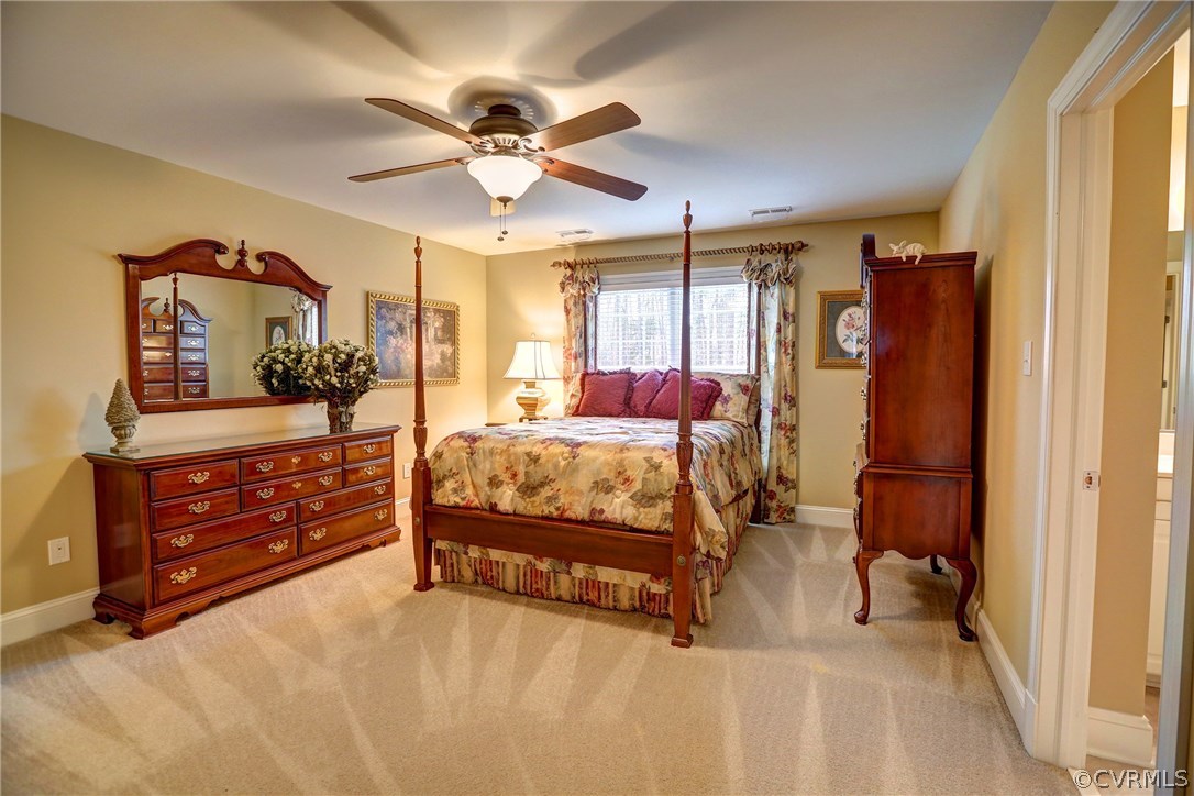 404 Wellfield Road Manakin-Sabot, VA 23103 - Photo 19 of 27 a bedroom with a bed and a dresser