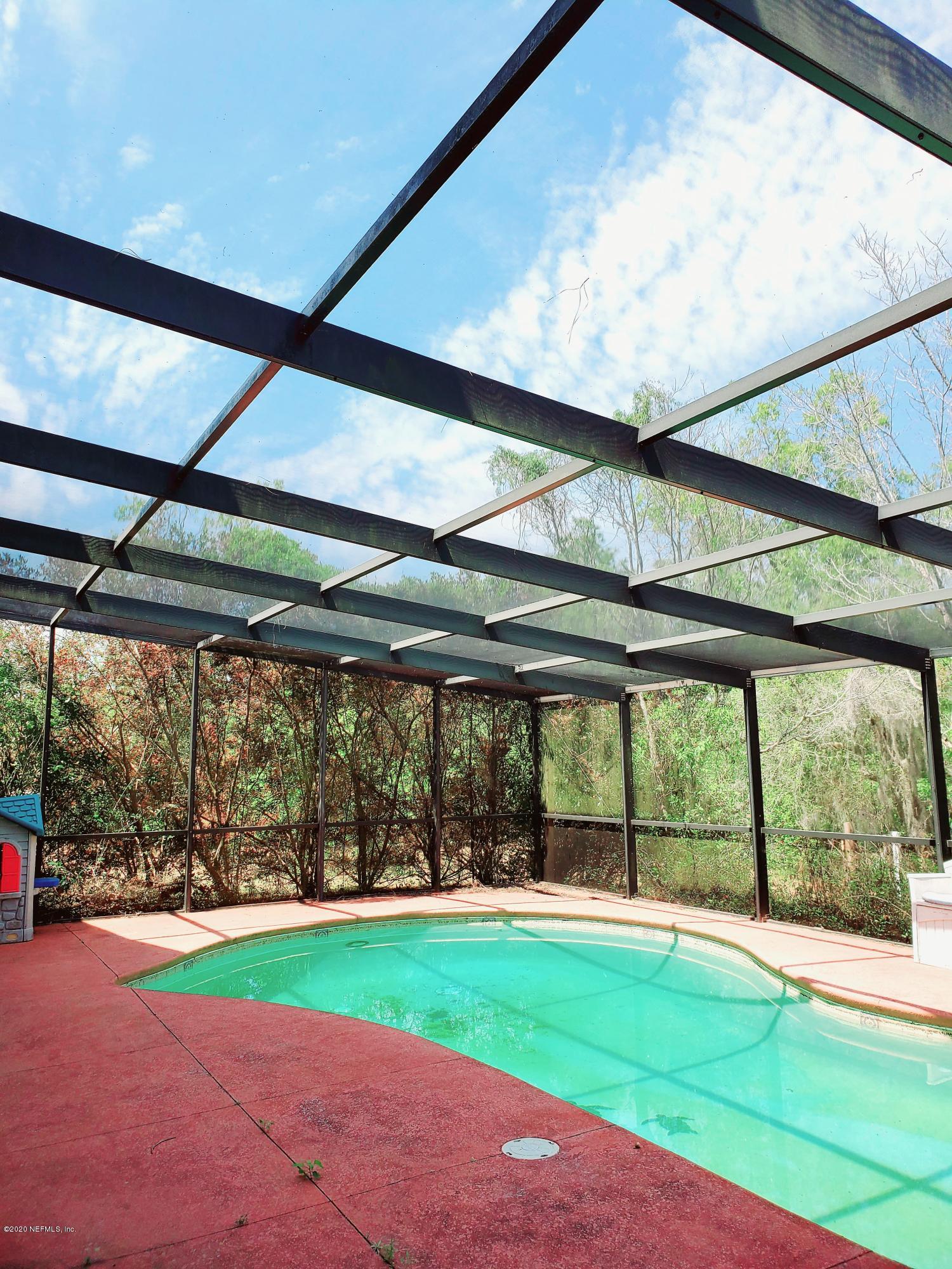 7001 Elfo Road Keystone Heights, FL 32656 - Photo 3 of 6 a view of outdoor space and porch