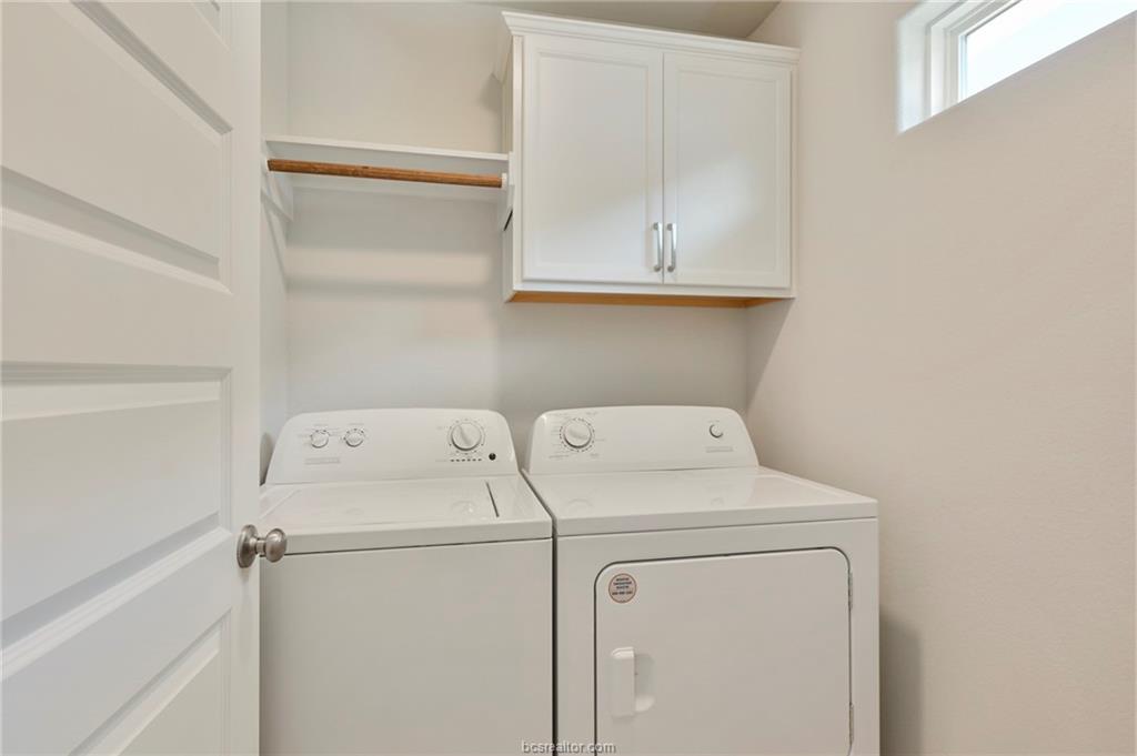 3124 Tarleton Court Bryan, TX 77808 - Photo 19 of 22 a utility room with dryer and washer