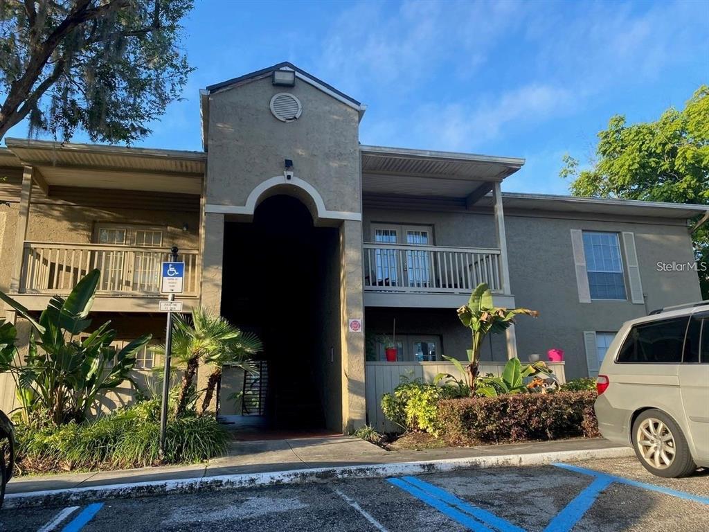 395 Wymore Road, Unit 200 Altamonte Springs, FL 32714 - Photo 1 of 1 a front view of a house with garden