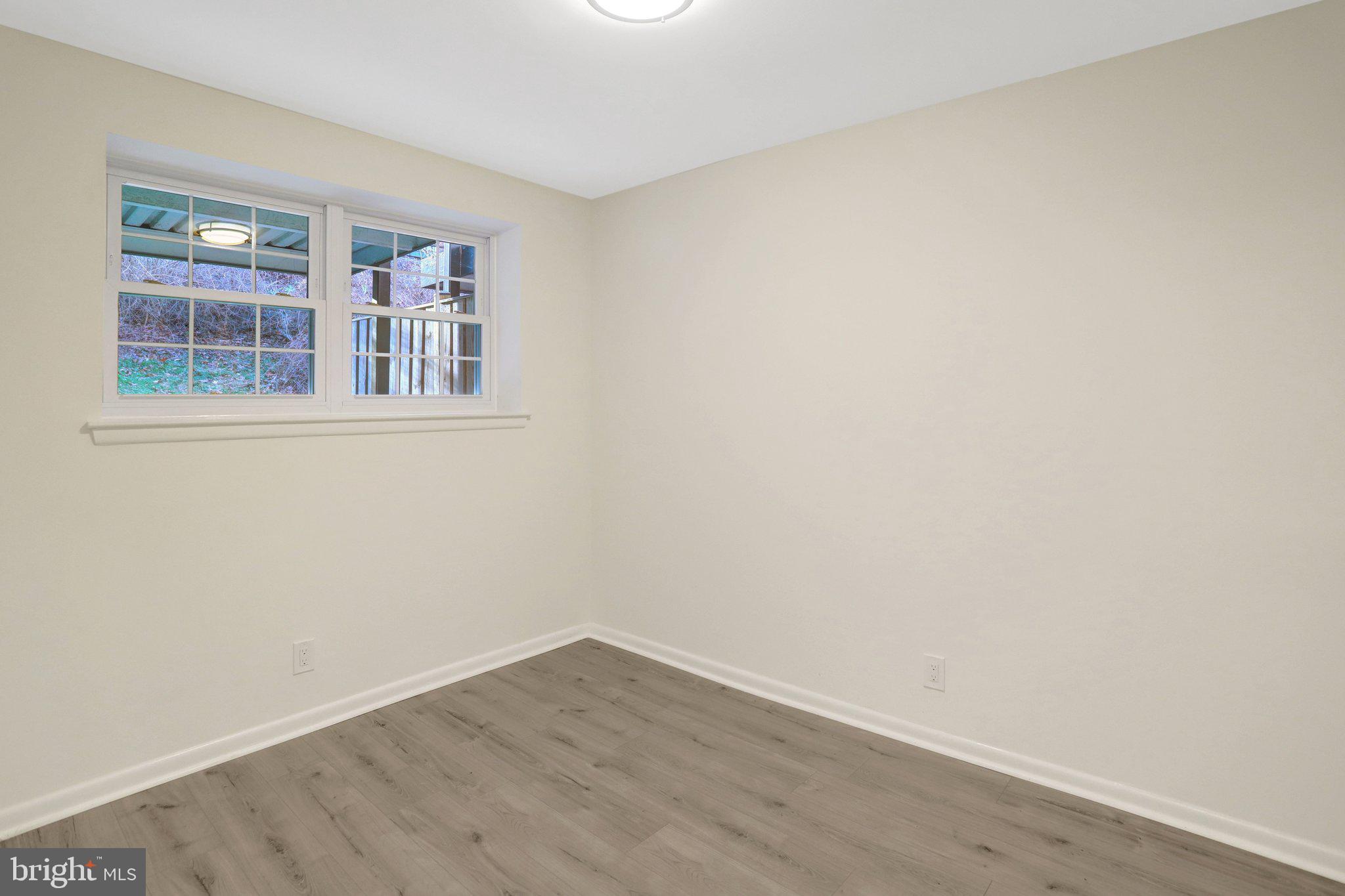 4619 28th Road South, Unit A Arlington, VA 22206 - Photo 22 of 30 wooden floor in an empty room