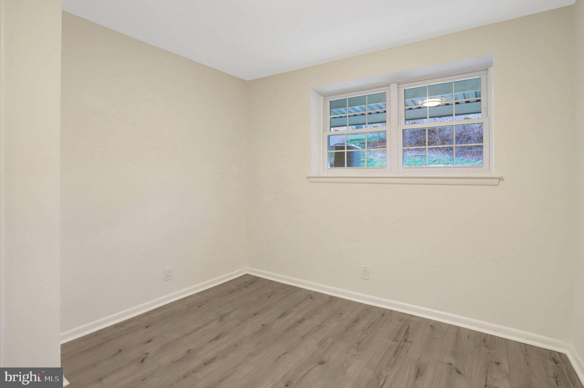 4619 28th Road South, Unit A Arlington, VA 22206 - Photo 23 of 30 an empty room with a window