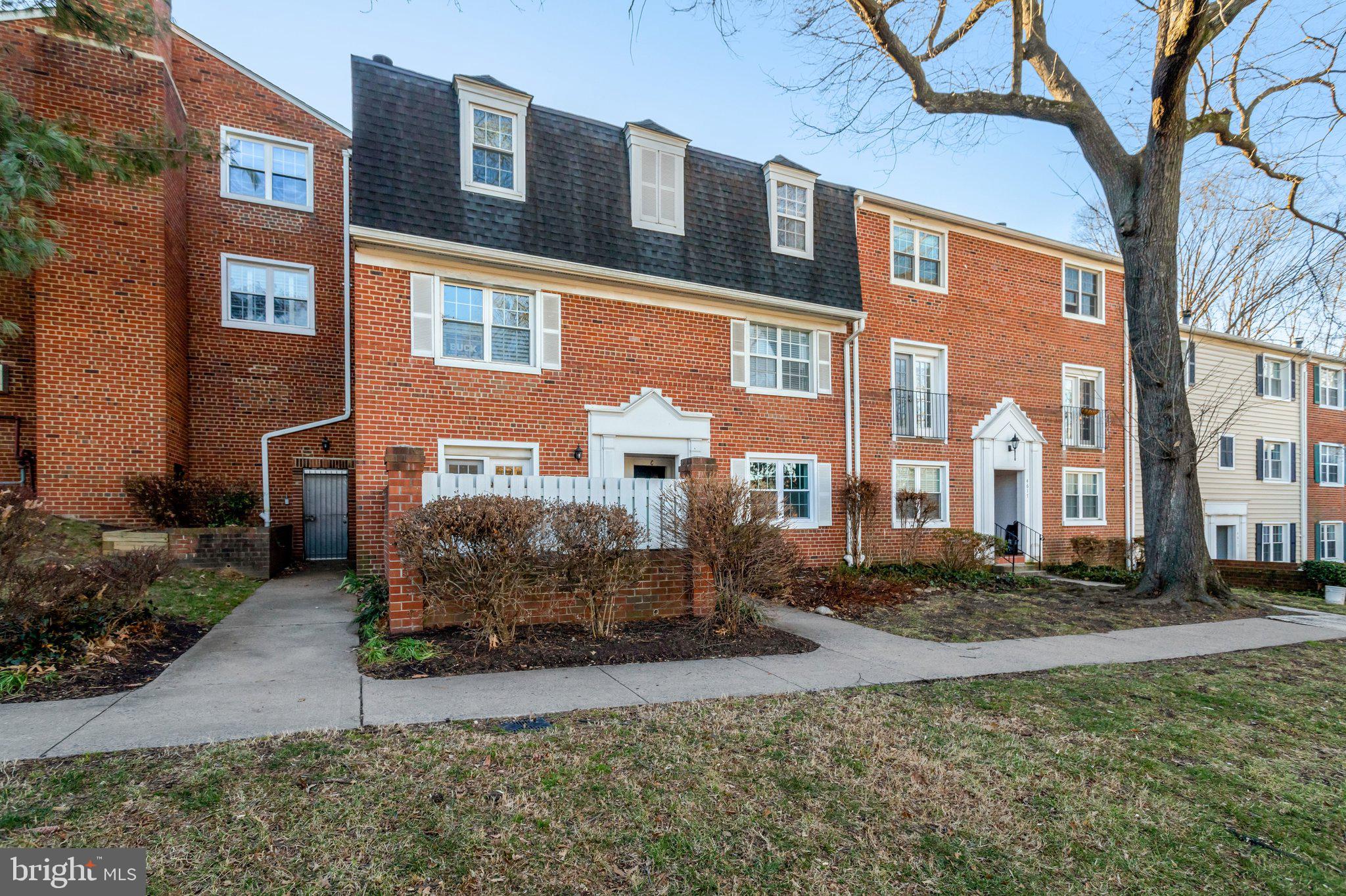 4619 28th Road South, Unit A Arlington, VA 22206 - Photo 3 of 30 a front view of a house with garden