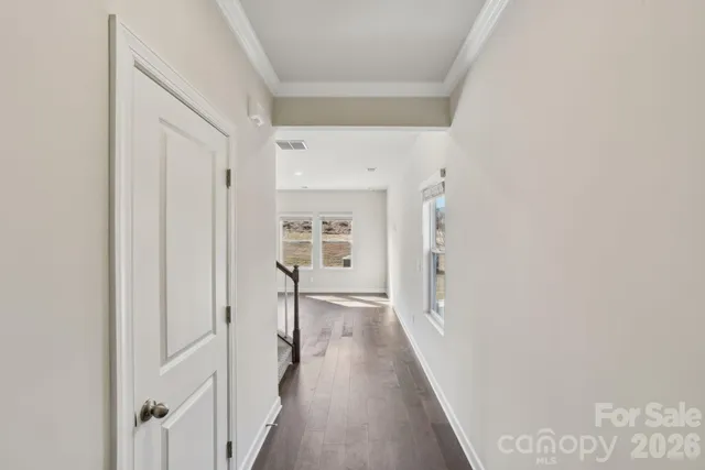 a view of hallway with stairs