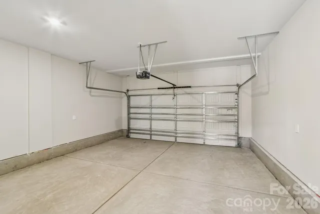 a view of an empty room with racks on the wall