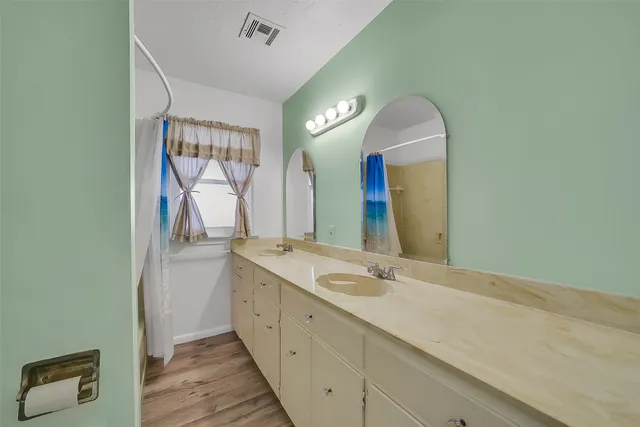 a hallway with dresser