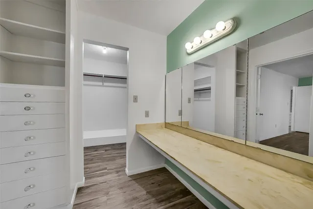 a view of small space with racks on the wall