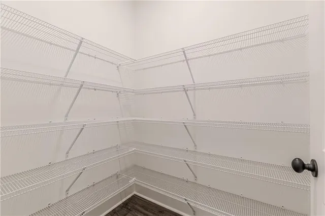 a bathroom with a bathtub and a toilet