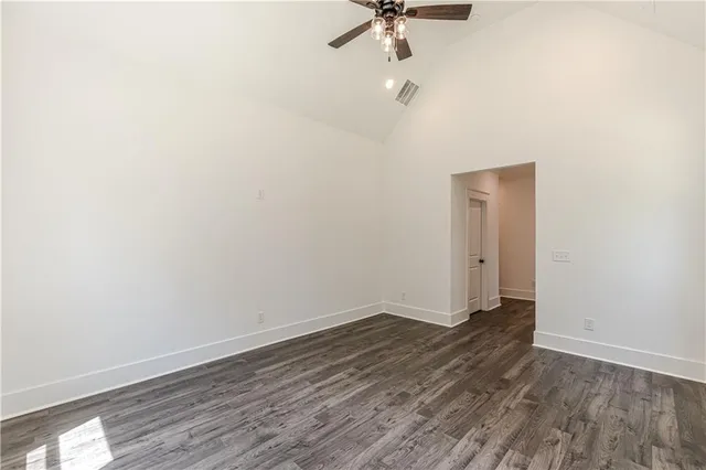 a bathroom with a toilet and a tub