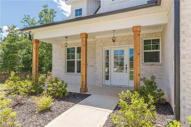 a view of a bathroom with a glass door shower
