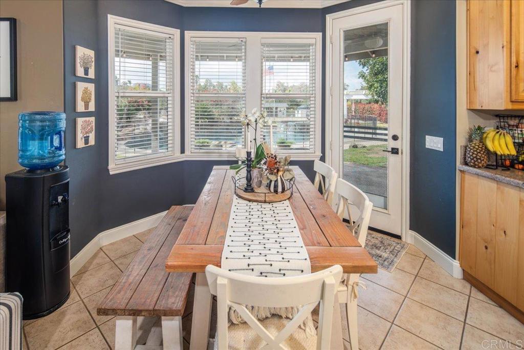 25057 Poderio Drive Ramona, CA 92065 - Photo 12 of 36 a bed sitting in a bedroom next to a window