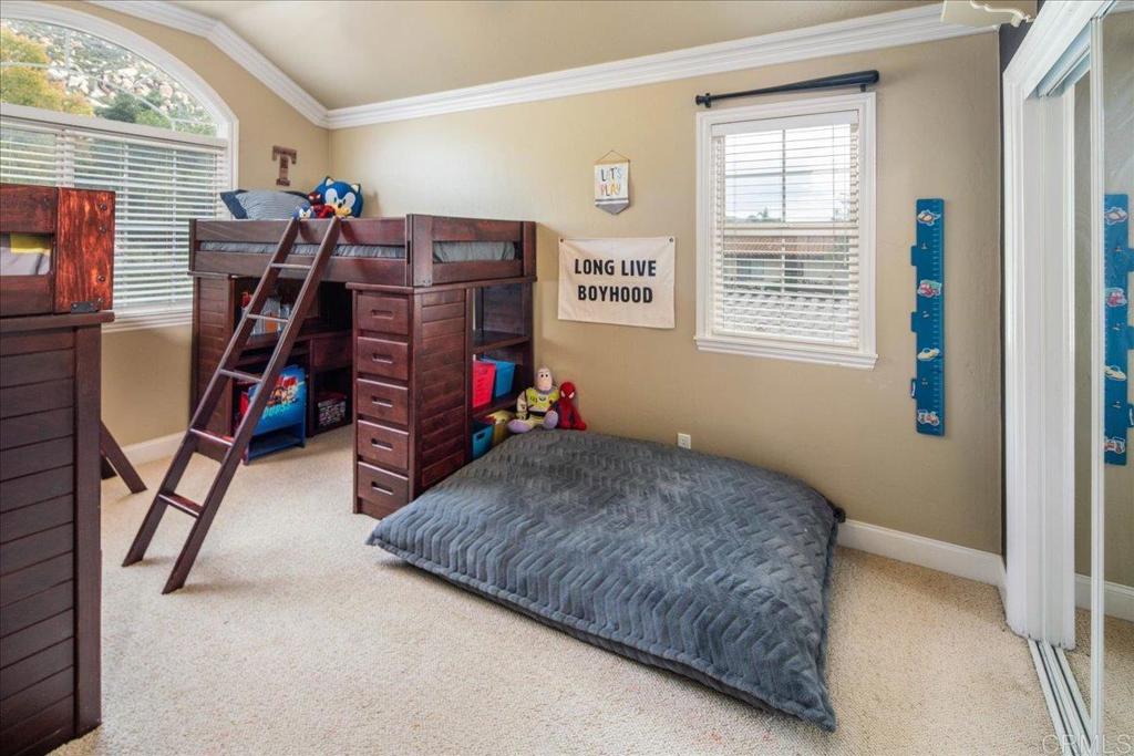 25057 Poderio Drive Ramona, CA 92065 - Photo 20 of 36 a bed room with a bed and a window