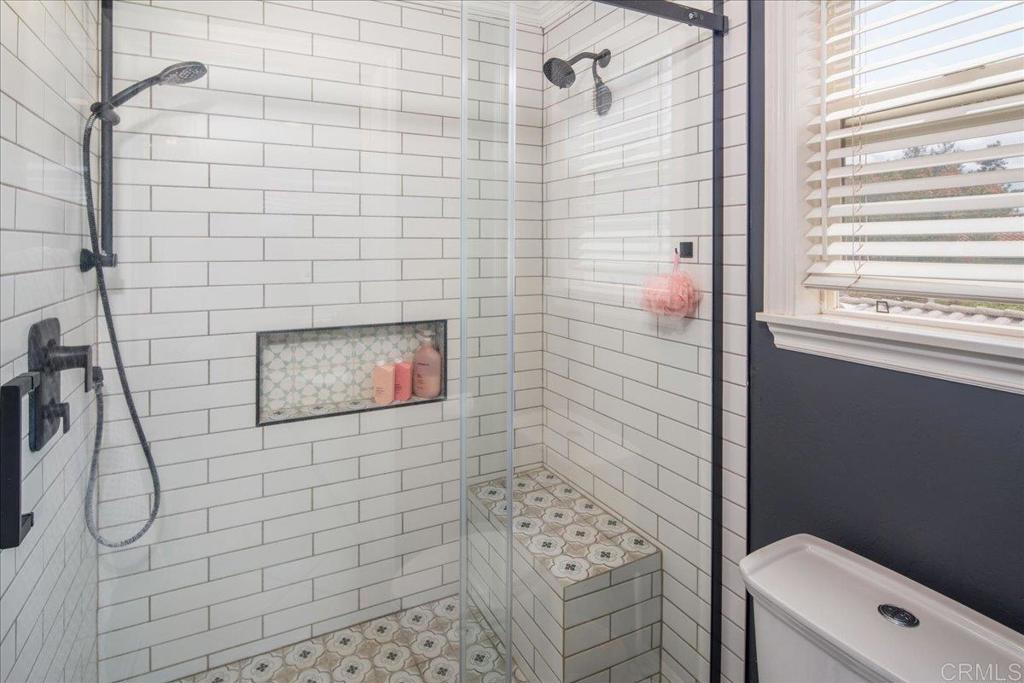 25057 Poderio Drive Ramona, CA 92065 - Photo 24 of 36 a bathroom with a toilet and a shower