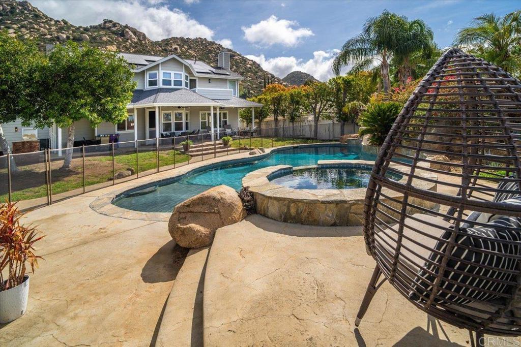 25057 Poderio Drive Ramona, CA 92065 - Photo 28 of 36 a view of swimming pool with outdoor seating and plants
