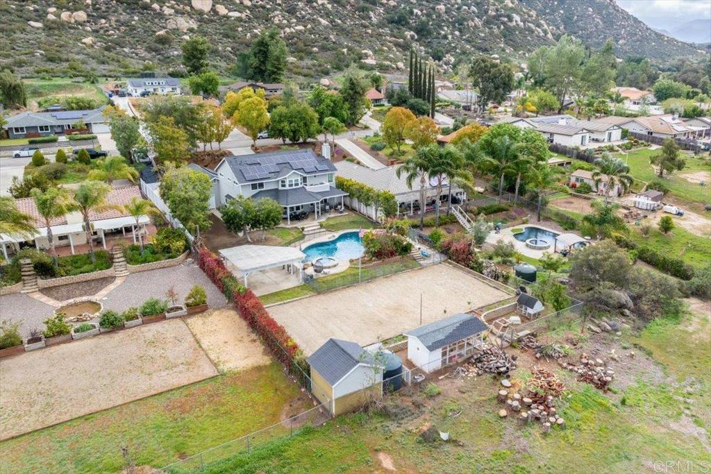 25057 Poderio Drive Ramona, CA 92065 - Photo 4 of 36 an aerial view of residential houses with outdoor space
