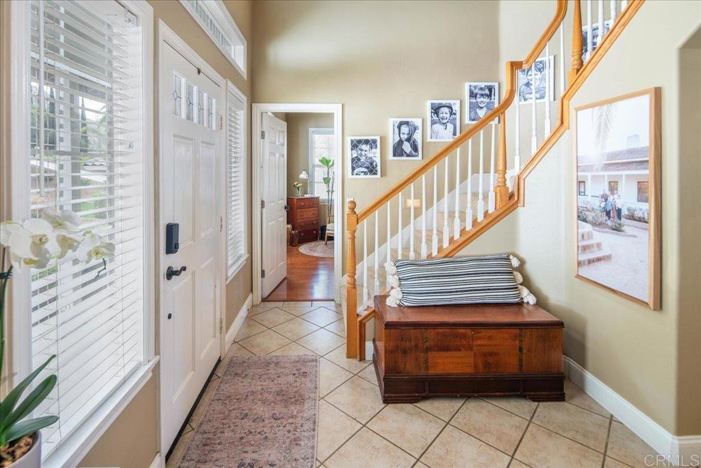 25057 Poderio Drive Ramona, CA 92065 - Photo 7 of 36 a view of entryway and hall with wooden floor