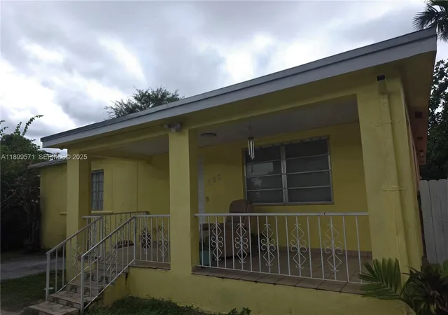 a view of balcony with a potted plants