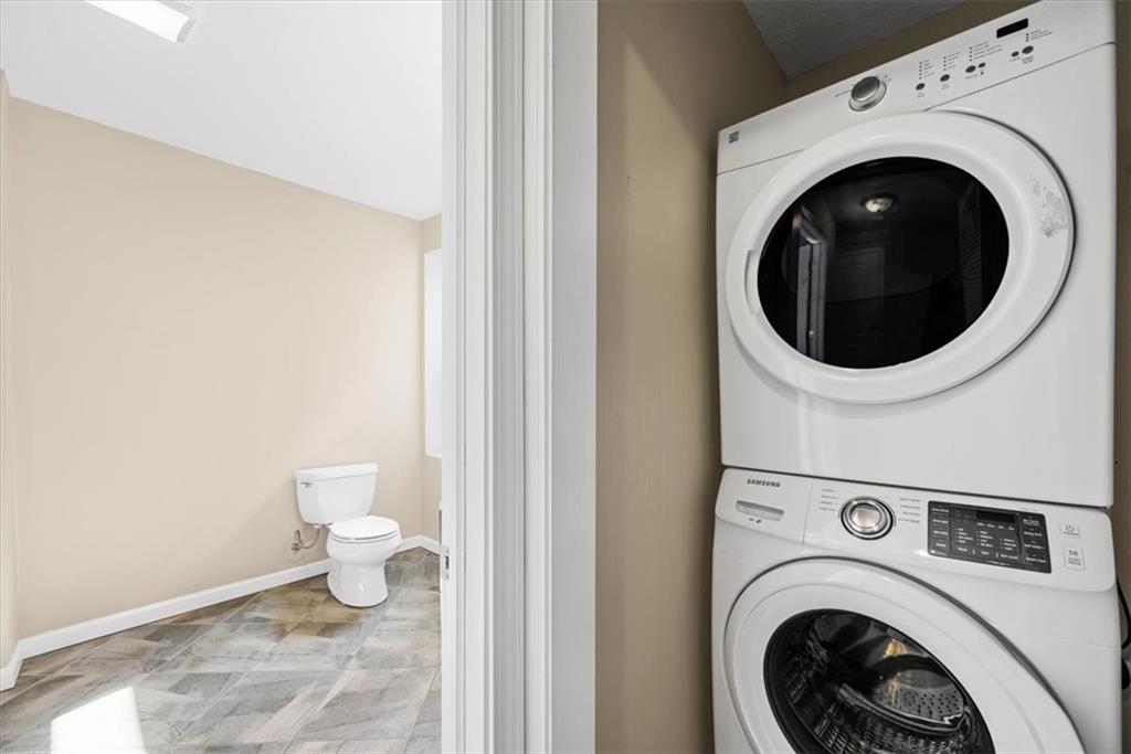 245 37th Street Pittsburgh, PA 15201 - Photo 12 of 29 a view of a bathroom with a washer and dryer