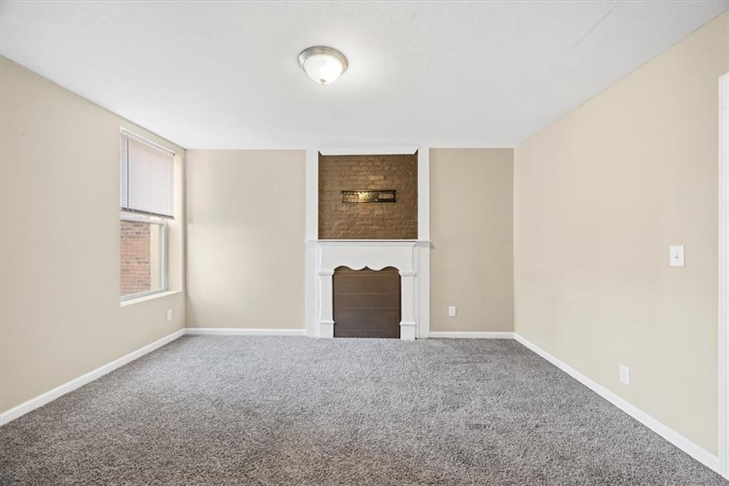 245 37th Street Pittsburgh, PA 15201 - Photo 16 of 29 an empty room with windows and closet
