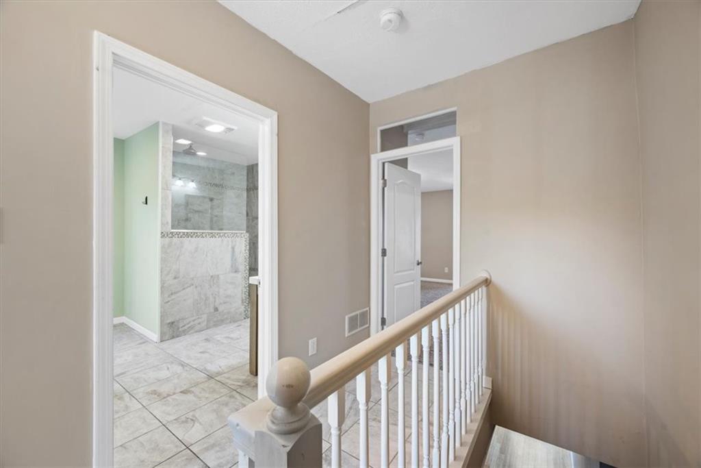 245 37th Street Pittsburgh, PA 15201 - Photo 19 of 29 a view of a hallway with wooden floor and staircase