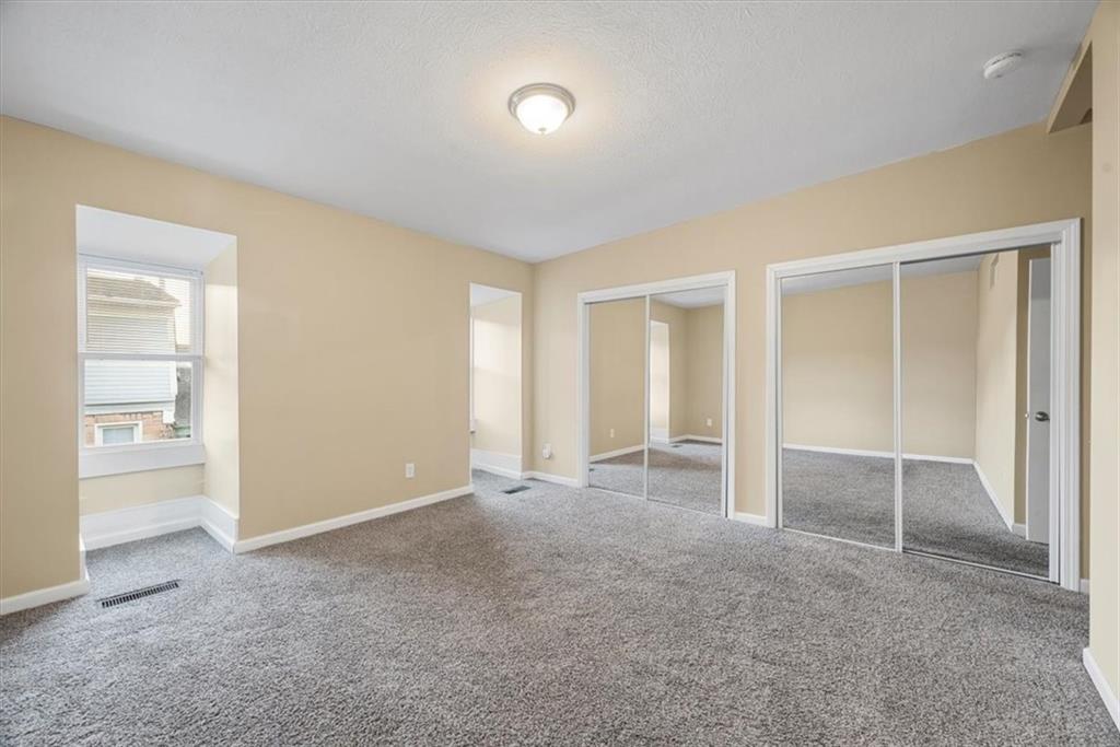 245 37th Street Pittsburgh, PA 15201 - Photo 22 of 29 an empty room with a natural light