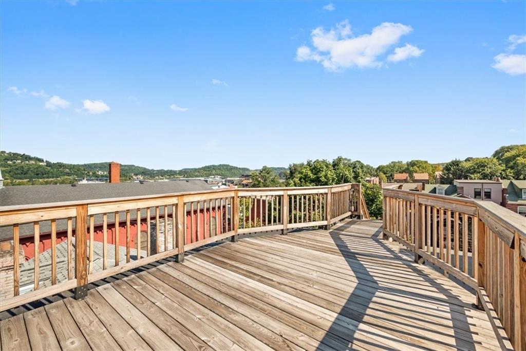 245 37th Street Pittsburgh, PA 15201 - Photo 24 of 29 a view of a balcony with wooden floor