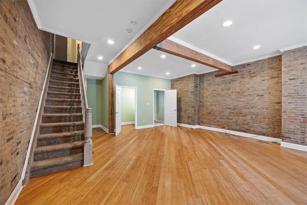 245 37th Street Pittsburgh, PA 15201 - Photo 3 of 29 a view of an empty room with wooden floor