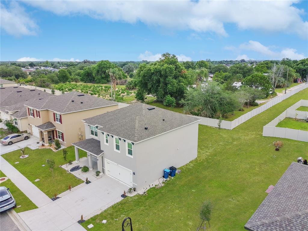 2085 Doe Run Drive Davenport, FL 33837 - Photo 3 of 44 an aerial view of a house