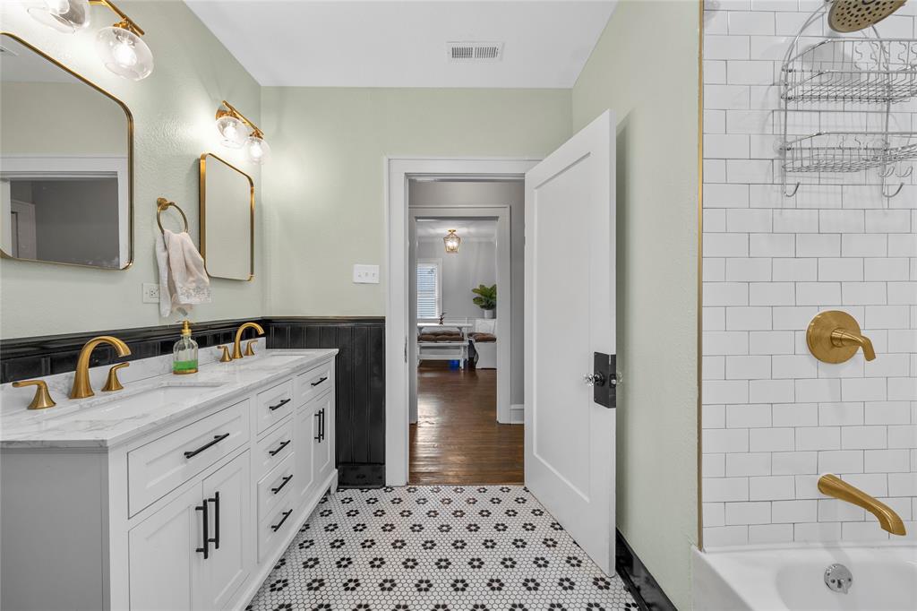 628 North 33rd Street Waco, TX 76710 - Photo 27 of 35 a bathroom with a sink a vanity and a mirror
