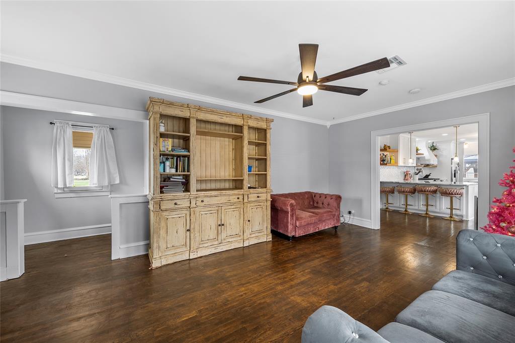 628 North 33rd Street Waco, TX 76710 - Photo 28 of 35 a living room with furniture and wooden floor