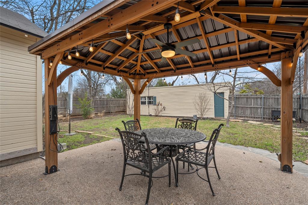 628 North 33rd Street Waco, TX 76710 - Photo 30 of 35 a view of an outdoor space with a table and chair in the patio