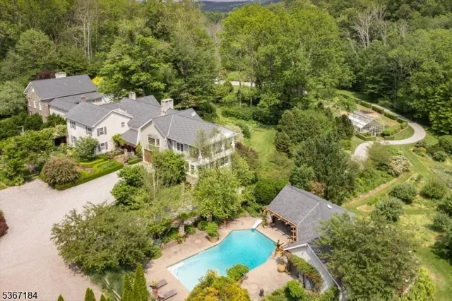 an aerial view of residential house with outdoor space