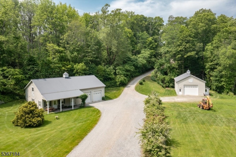 936 Dove Island Road Newton, NJ 07860 - Photo 50 of 50 an aerial view of a house with swimming pool and garden