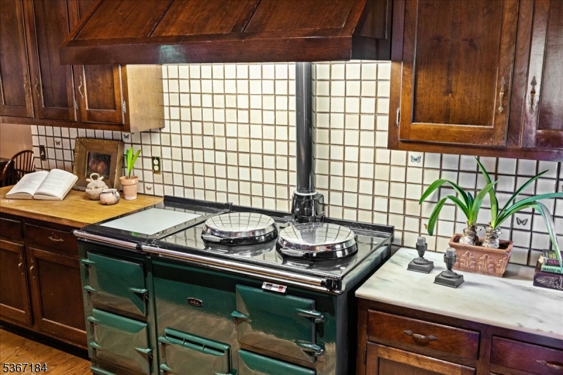 936 Dove Island Road Newton, NJ 07860 - Photo 6 of 50 a kitchen with a sink stove and cabinets