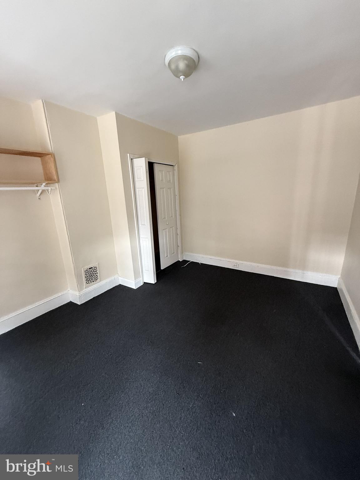 3203 Pearl Street Philadelphia, PA 19104 - Photo 12 of 12 a view of an empty room with a window