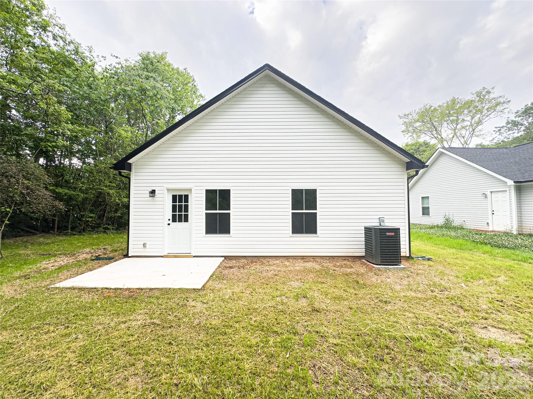 4 6th Street, Unit 4 Spencer, NC 28159 - Photo 16 of 16 a view of a house with a yard