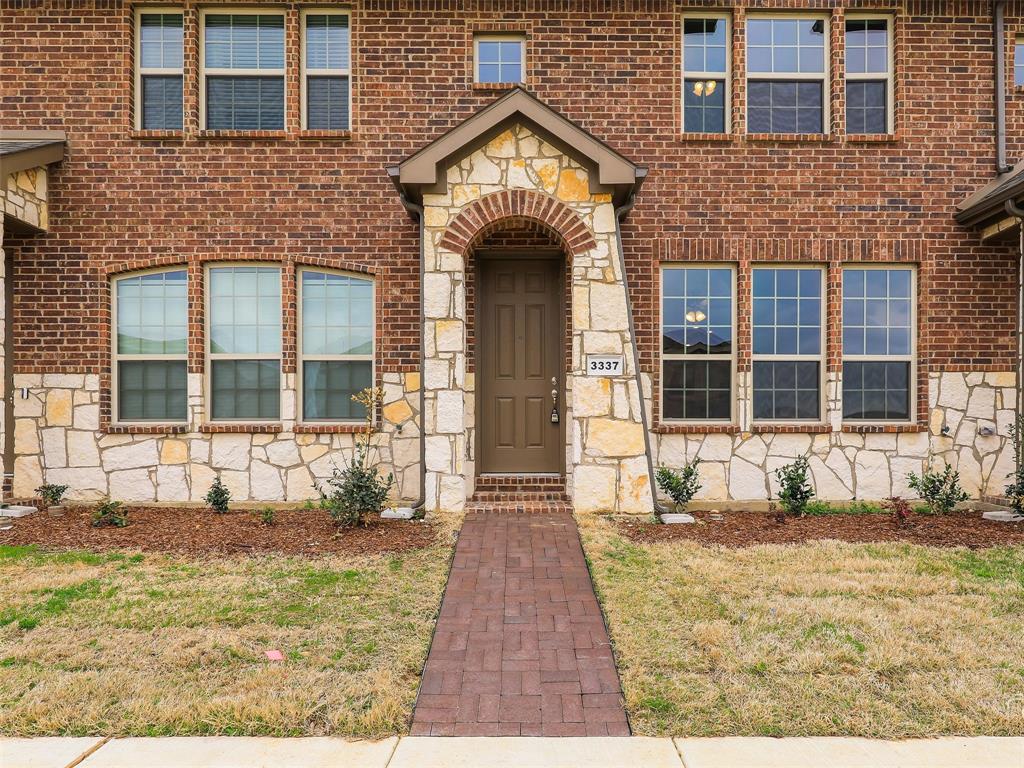 3337 Solana Circle Denton, TX 76207 - Photo 2 of 22 Entrance to property with stone siding and brick siding
